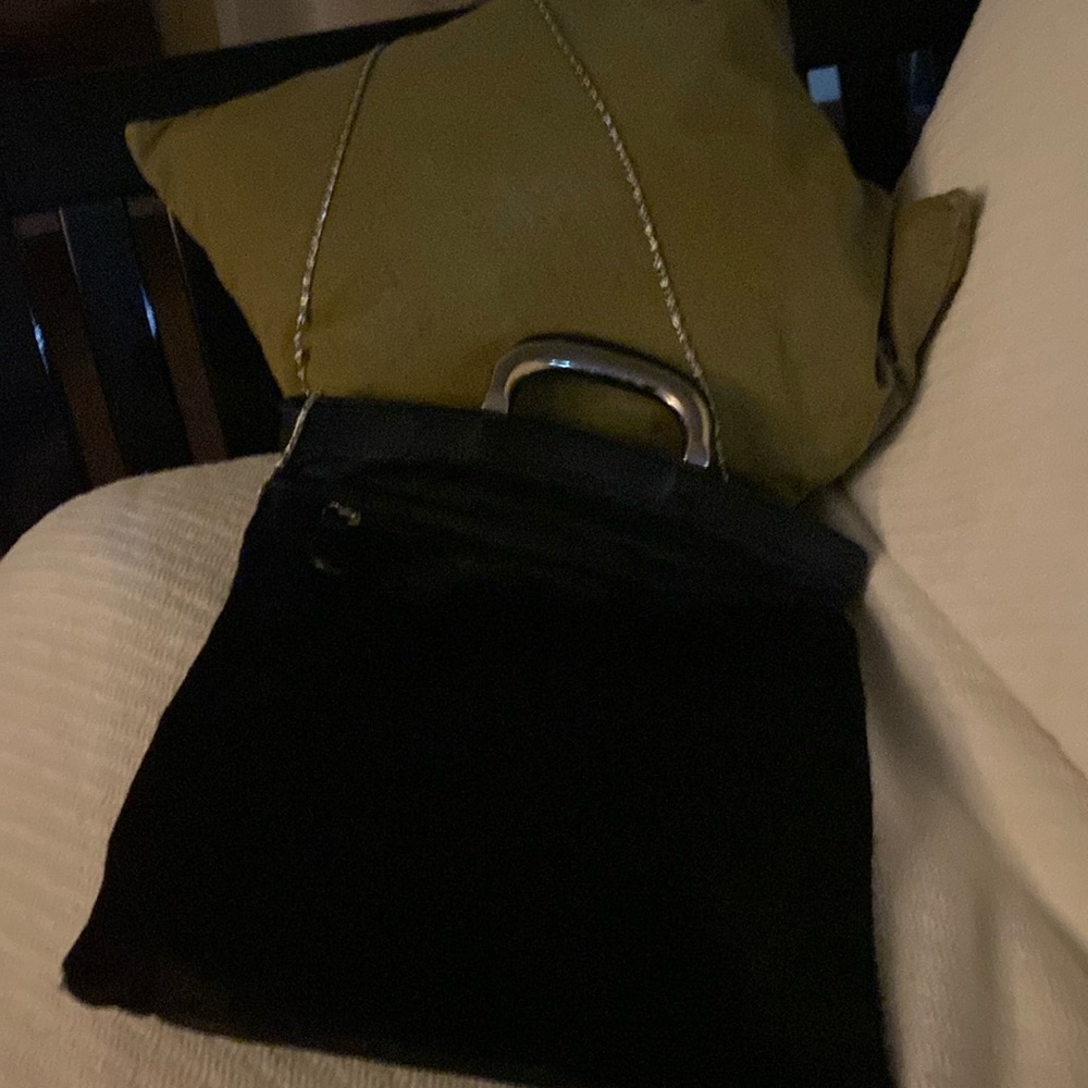 Maritzio Tauti crafted the ideal bag w black fur and Lamb leather